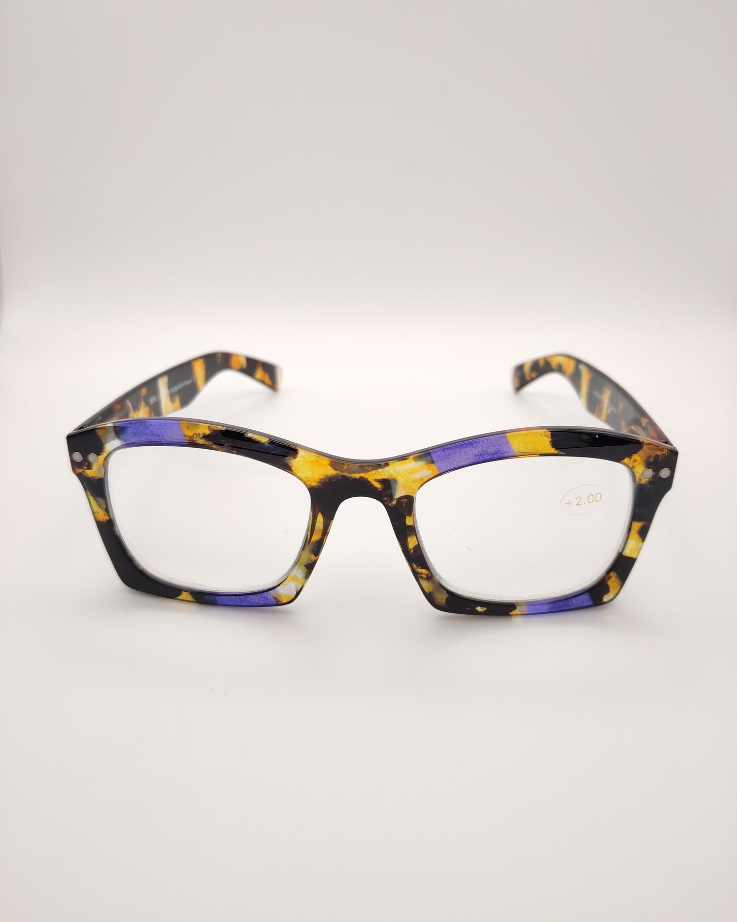 gafas premontadas para presbicia modelo k_eyes_k23-sunset con montura rectangular en acetato carey con detalles en tonos morado y amarillo, diseño moderno y llamativo