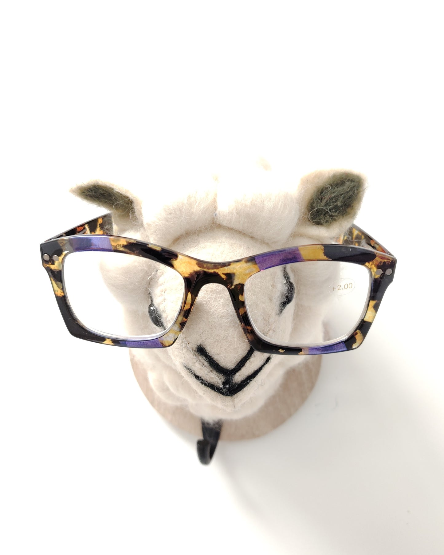gafas premontadas para presbicia modelo k_eyes_k23-sunset con montura rectangular en acetato carey con detalles en tonos morado y amarillo, diseño moderno y llamativo