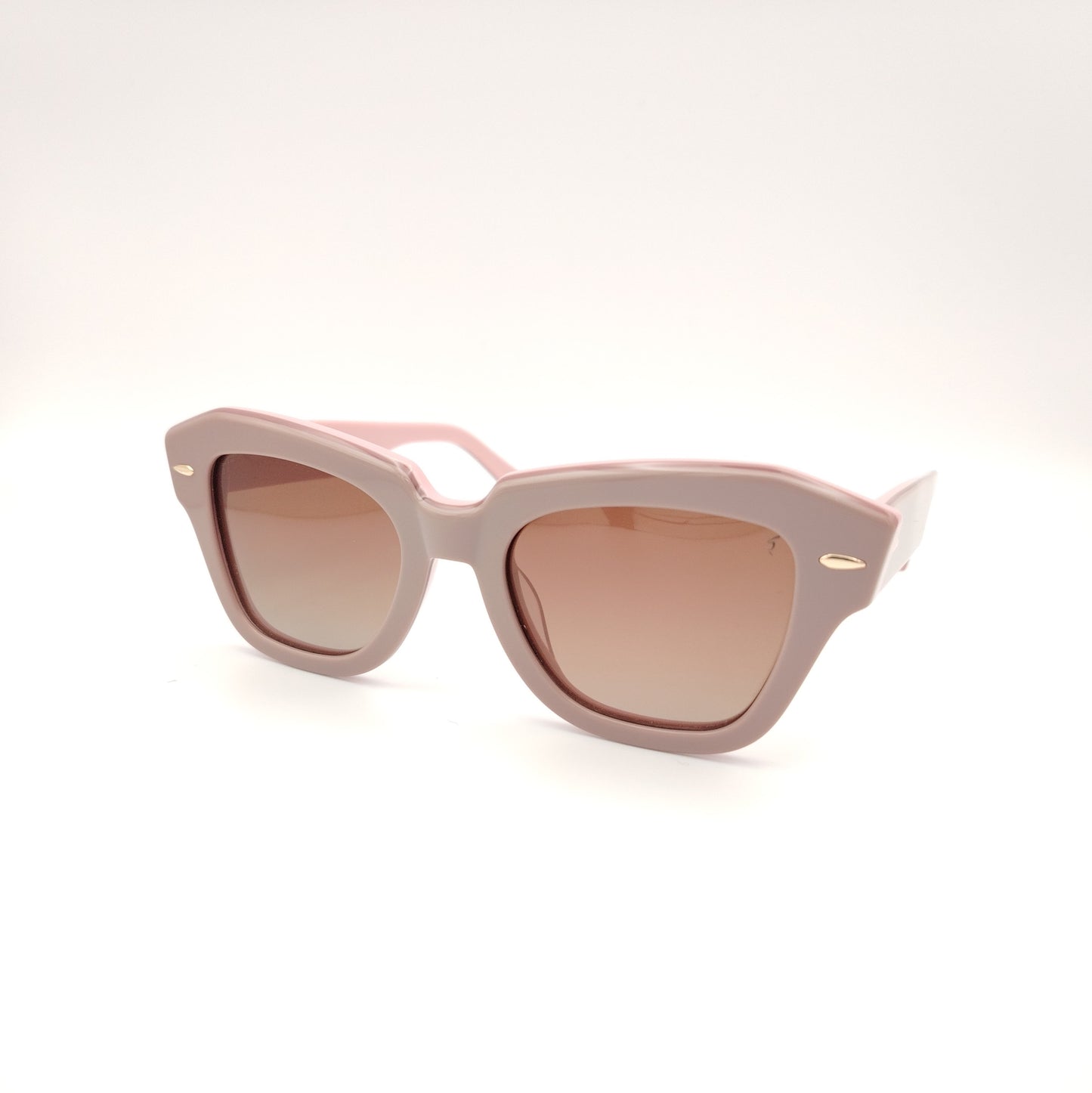 gafas de sol rischio r21423 c11 con montura geométrica en acetato rosa empolvado y lentes marrones degradadas, diseño elegante y femenino