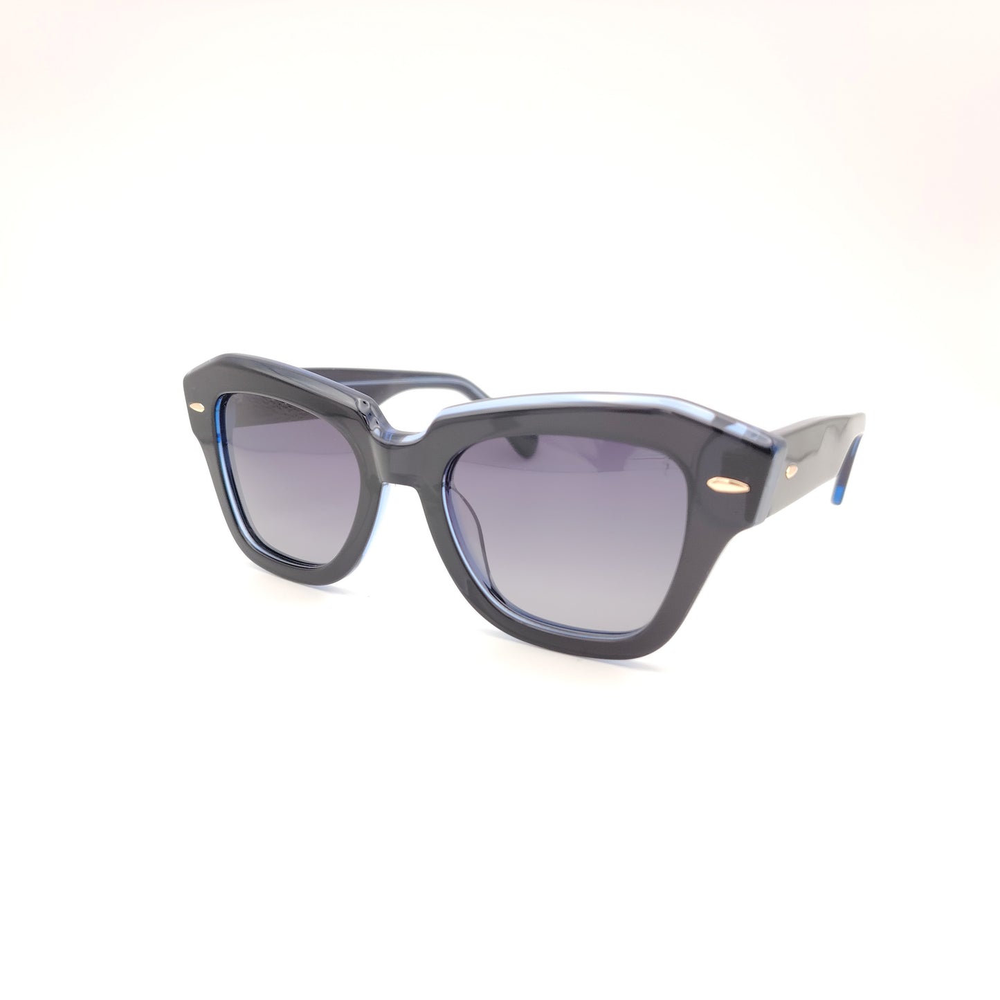 gafas de sol rischio r21423 en acetato azul y negro con lentes polarizadas