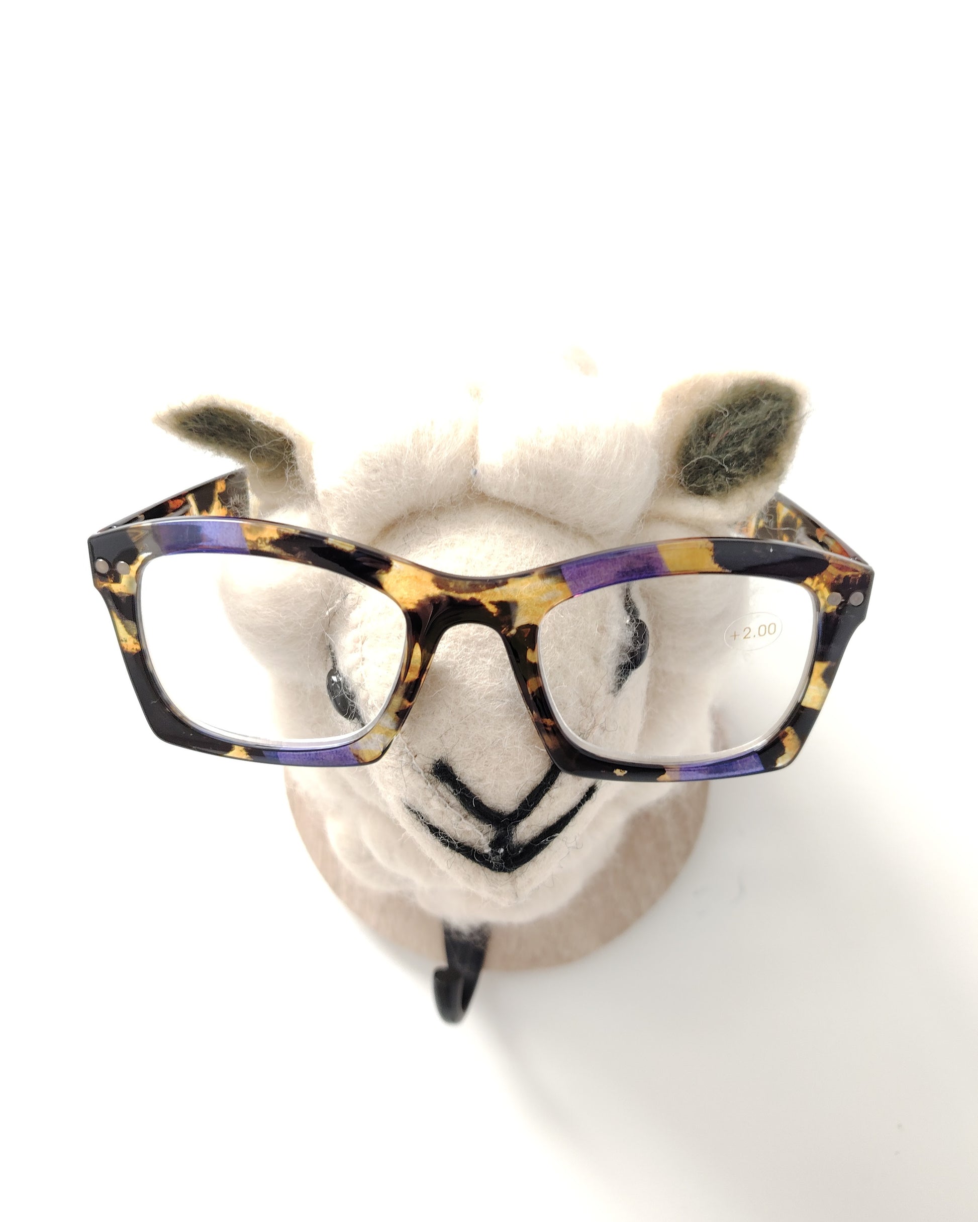 gafas premontadas para presbicia modelo k_eyes_k23-sunset con montura rectangular en acetato carey con detalles en tonos morado y amarillo, diseño moderno y llamativo
