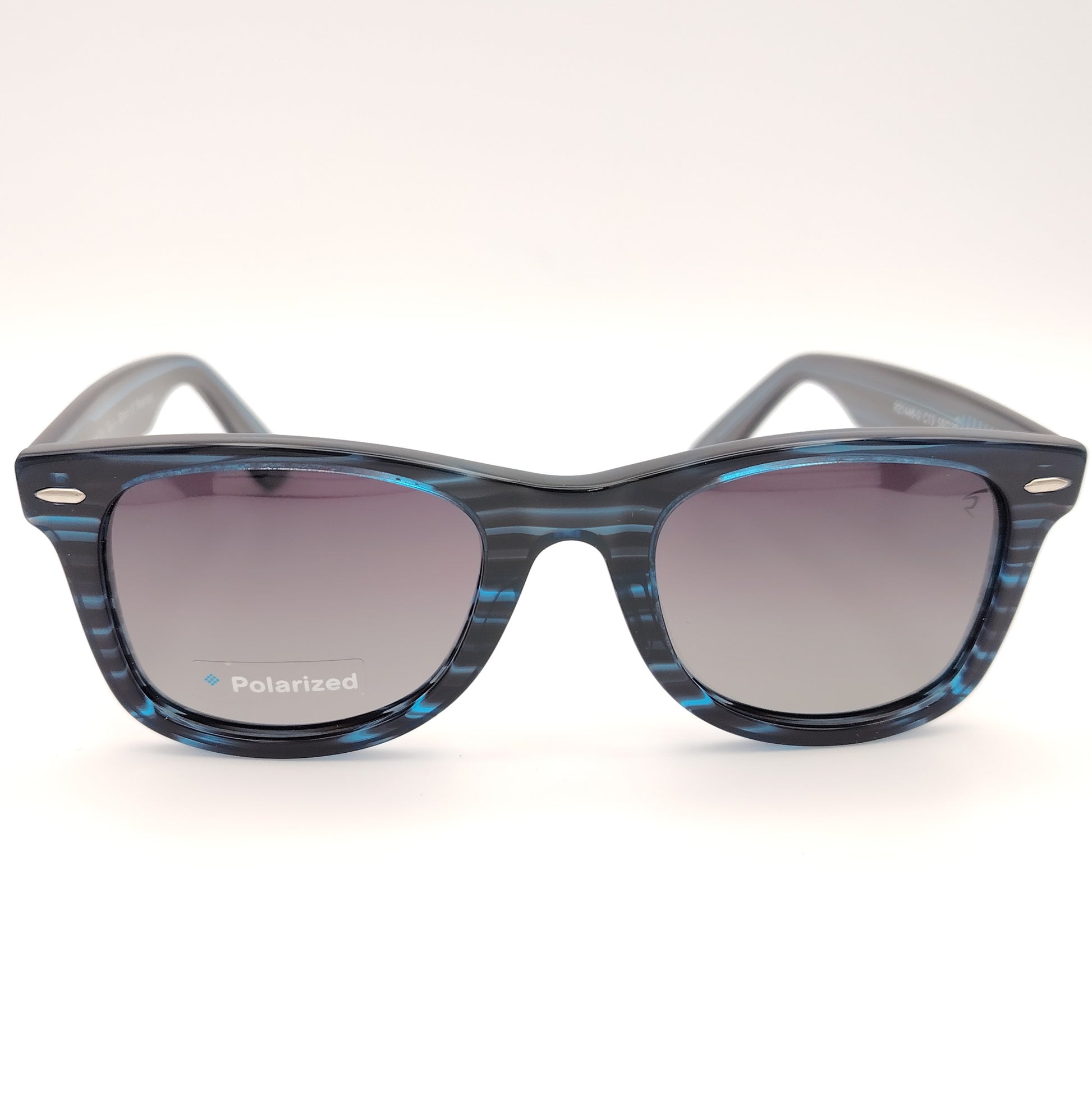 gafas de sol rischio azul con montura jaspeada y lentes polarizadas degradadas