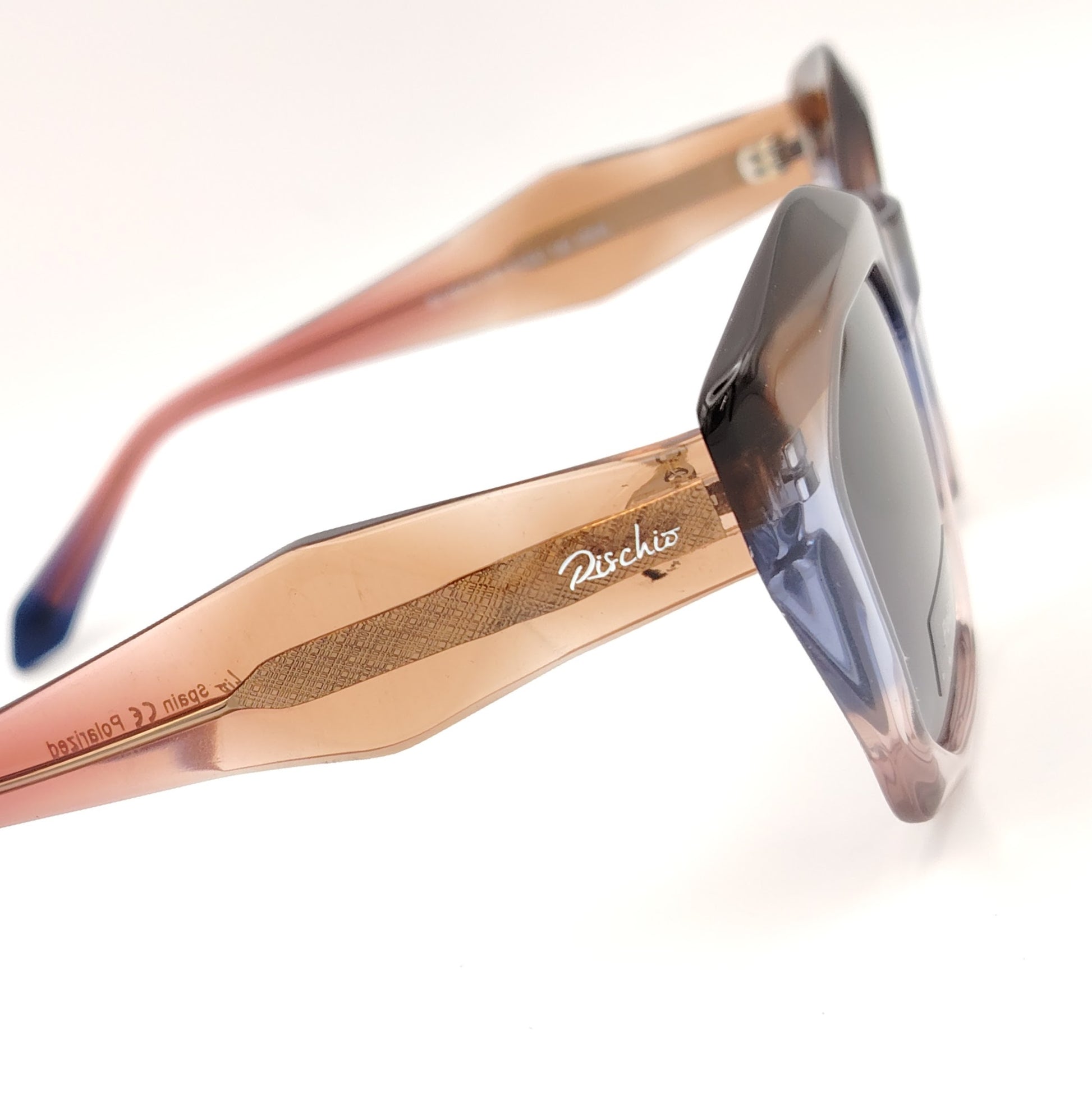gafas de sol polarizadas rischio r21464 c08 con montura de pasta degradada en tonos marrón y malva, y lentes oscuras polarizadas